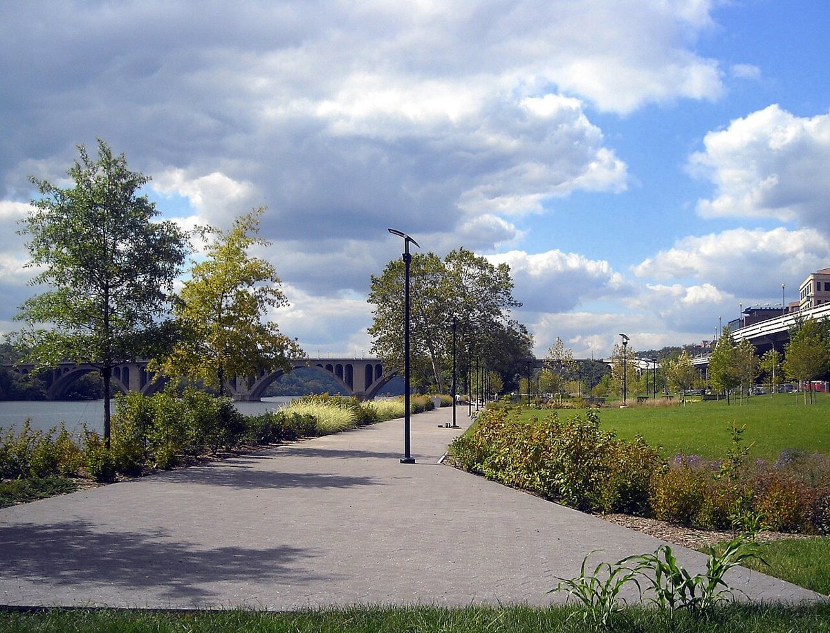 the paved riverside path and lawn at Georgetown Waterfront Park