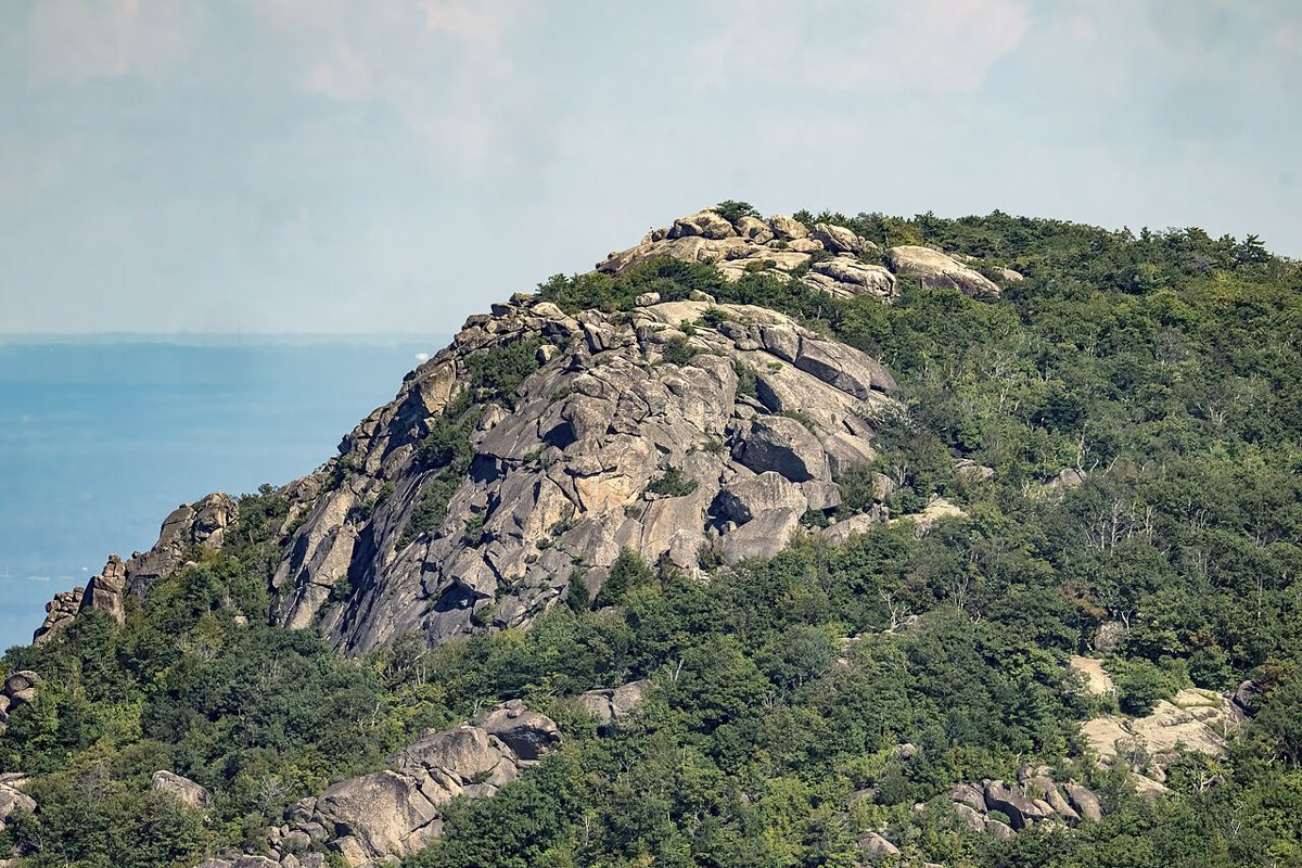 Hikers on the rock scramble section of Old Rag Mountain in Virginia