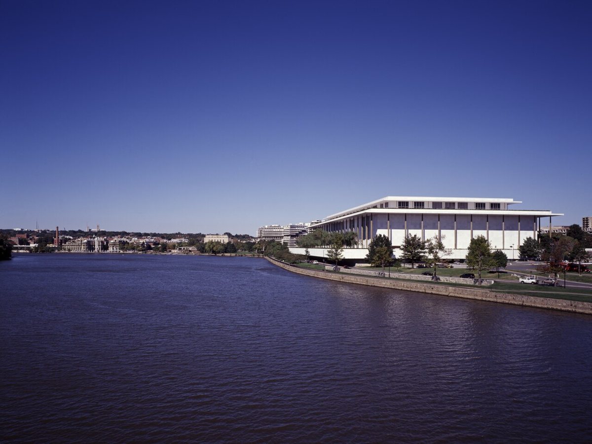 The Kennedy Center's riverside plaza in Washington DC on a summer evening
