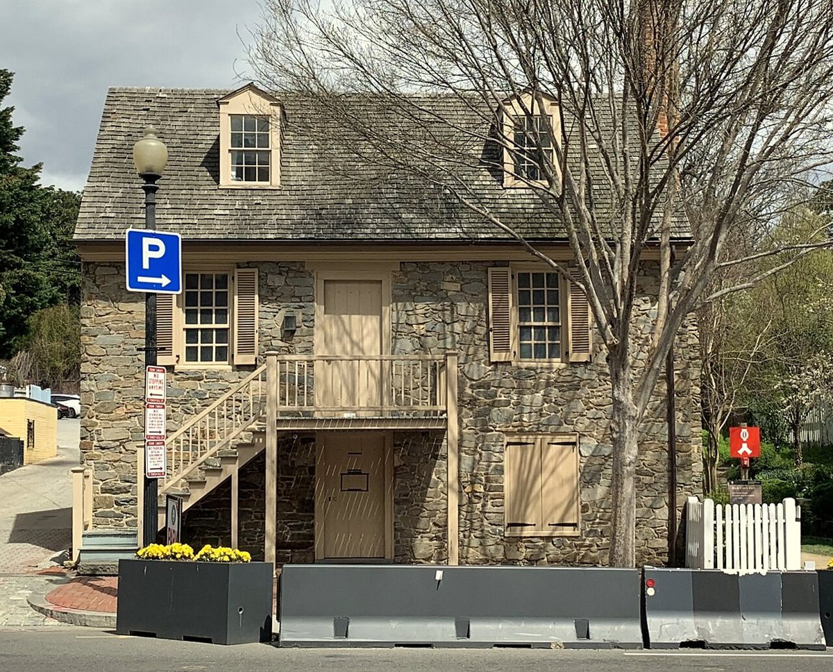 the colonial fieldstone facade of the Old Stone House on M Street in Georgetown
